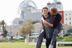 Athletic twinks Noah White and Evan Parker make out on playground photo 1
