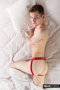 Young jock Danny shows off his round ass before jerking his hard cock photo 24