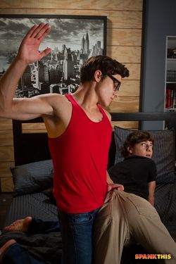 Muscular twink Blake Mitchell spank Cole Claire and make him moan photo 1