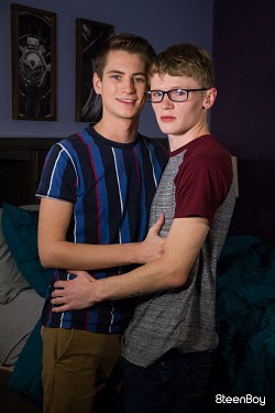Jimmy Andrews ejaculate all over skinny twink Trevor Harris' face photo 0