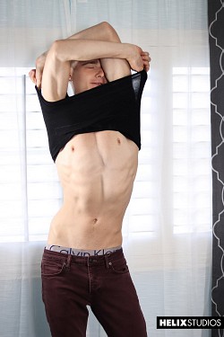 Young gay Travis Stevens jerking off his twink dick photo 2