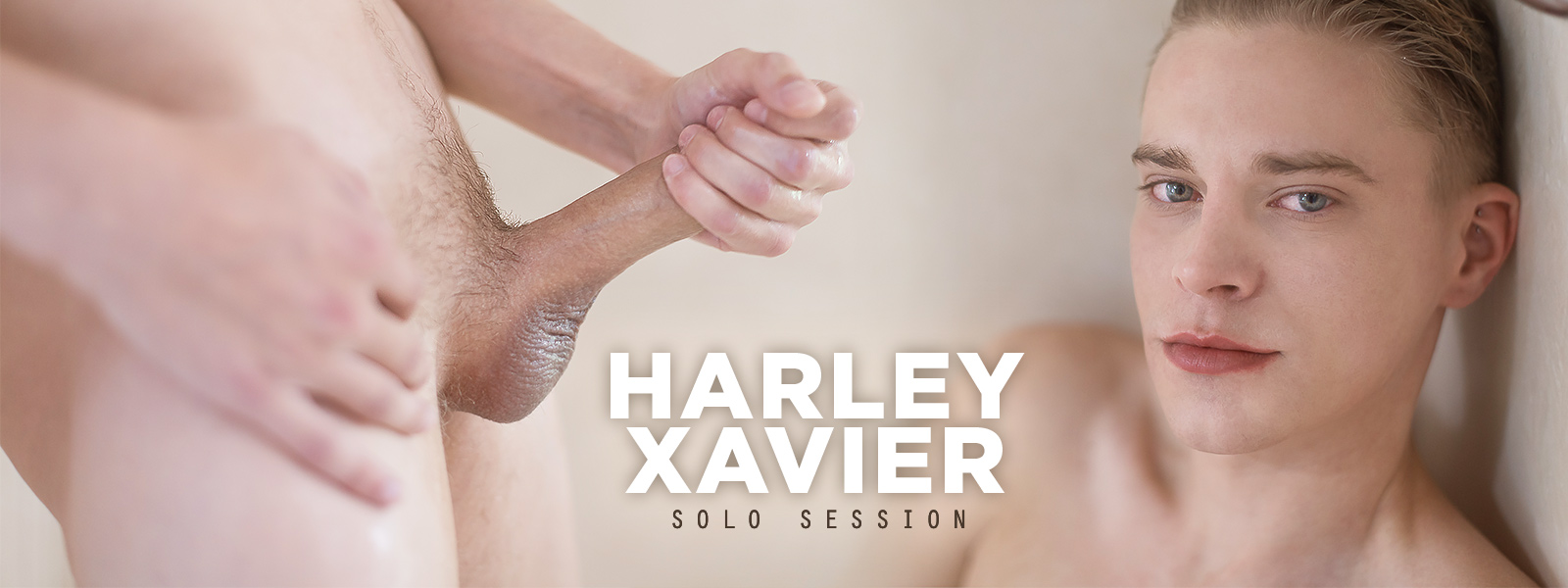 Harley Xavier stroking his giant cock in this scene.